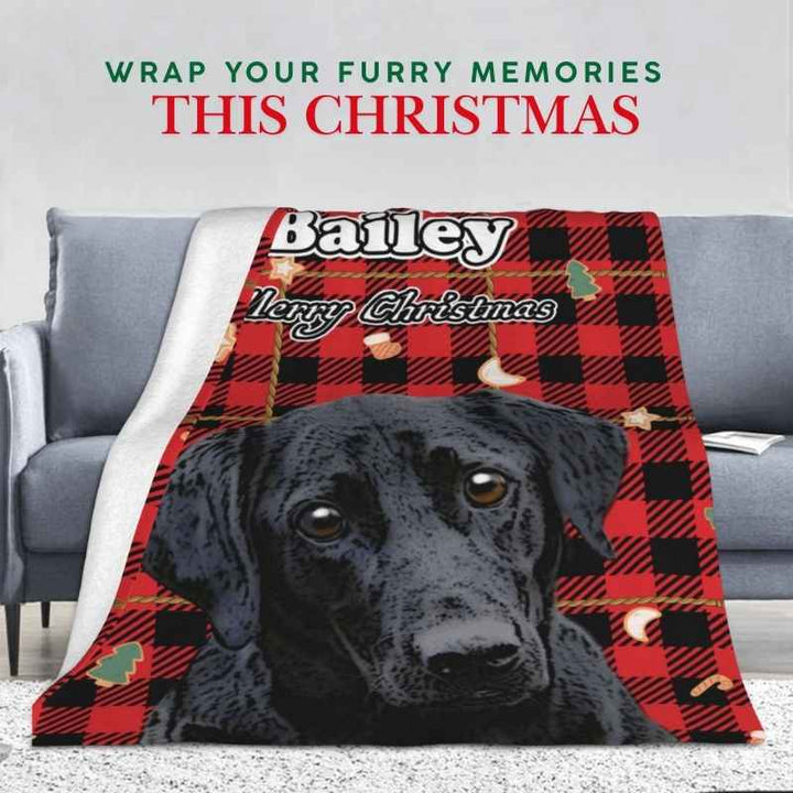 A red and black plaid blanket with a pet photo, festive decorations, and a name featuring 'Merry Christmas' text. 